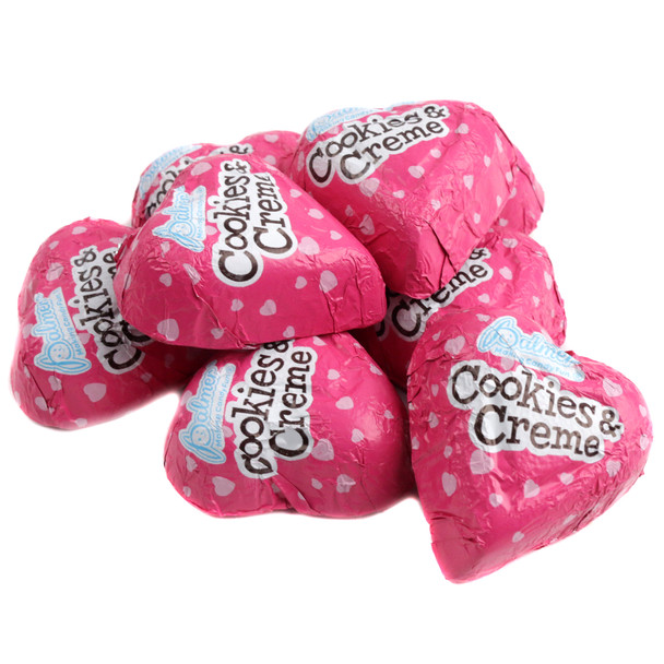 Pink, heart-shaped Cookies and Cream Valentine Hearts, creamy with crunchy cookie bits. Approx 45 hearts per pound.