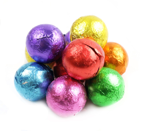 Alberts assorted milk chocolate balls, individually wrapped in vibrant rainbow foils, approx 60 per pound.