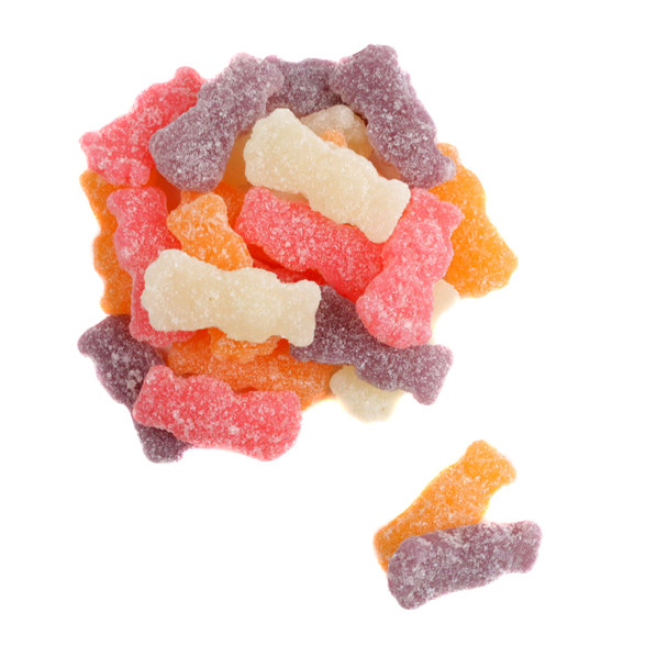 Vibrant Sour Patch Kids Tropical candy, sour then sweet chewy gummies, exotic fruit flavors like pineapple, passion fruit, paradise punch.