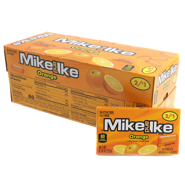 A cardboard retail display box containing a 24-pack of individual Mike and Ike Orange candy boxes, featuring the bright orange fruit-themed packaging