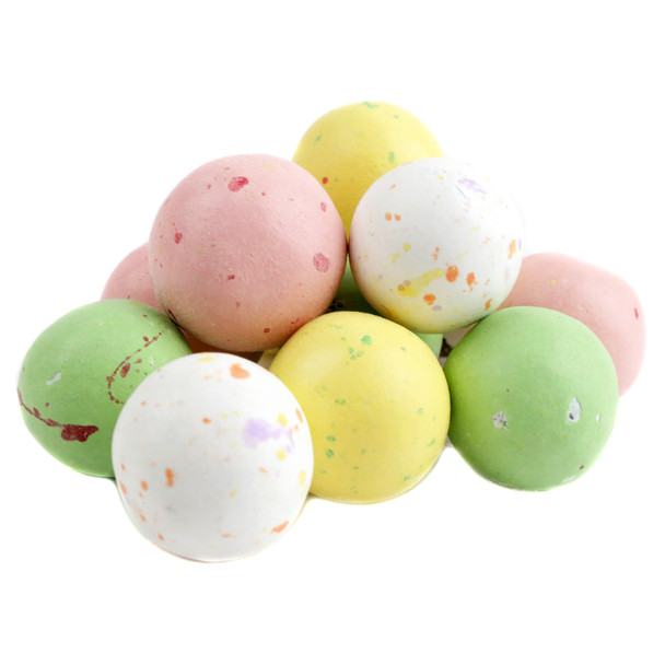 Numerous speckled pastel Easter Egg Malt Balls, milk chocolate covered with crunchy malt centers.