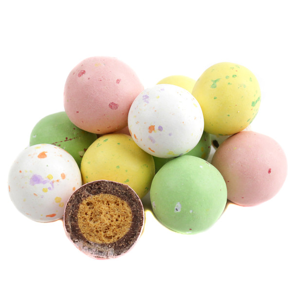 Multiple speckled egg malt balls, pastel colored, milk chocolate covered, crunchy, classic Easter candy, USA made.