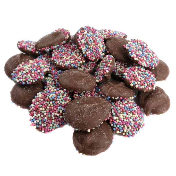 Repperts Rainbow Nonpareils Milk Chocolate discs. Creamy brown milk chocolate candy topped with colorful rainbow nonpareils.