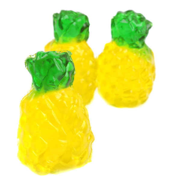 Realistic yellow and green 3D gummy pineapples, delicious pineapple flavored candy, approx. 55 per pound.