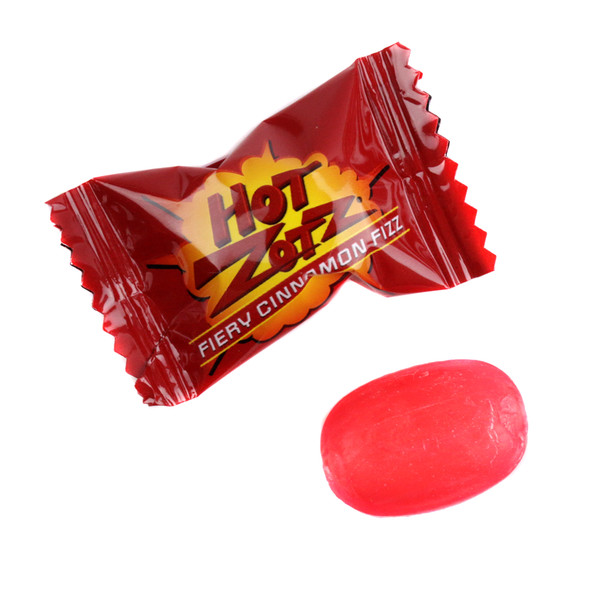 24 fiery cinnamon Hot Zots Strings, hard candy shells with hot fizzy centers, vivid red.