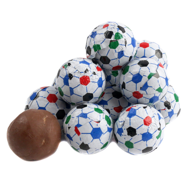 Madelaine milk chocolate soccer balls, individually foil-wrapped in black and white patterns, approx. 65 per pound.