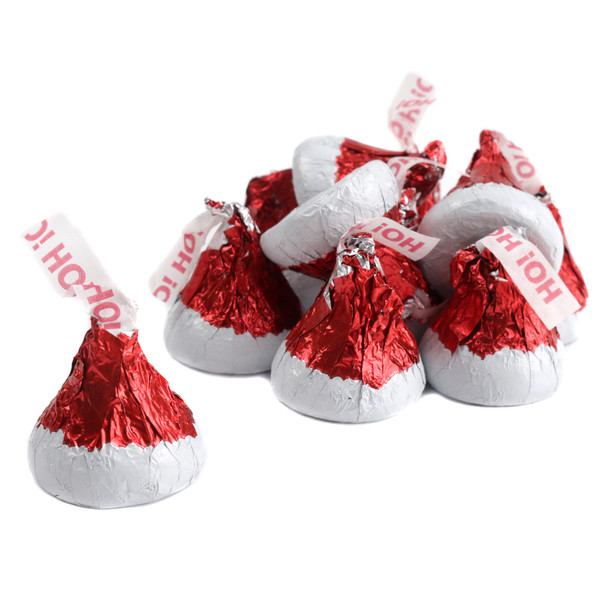 Christmas Milk Chocolate Hershey Kisses, red & white Santa hat foil, festive holiday candy.