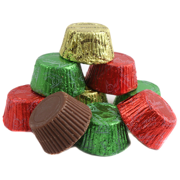 RM Palmer Christmas Peanut Butter Cups, approx 40 per lb, red, green, gold foil wrapped. Creamy peanut butter, rich milk chocolate.