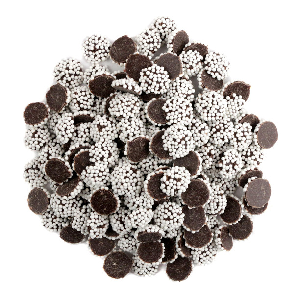 Many mini dark chocolate nonpareils, bite-sized candy, dark chocolate with white sprinkles.