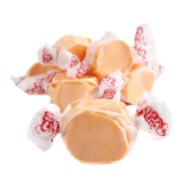 Tropical POG Passionfruit Orange Guava Salt Water Taffy, bright orange, yellow, pink colors, 65 chewy pieces.