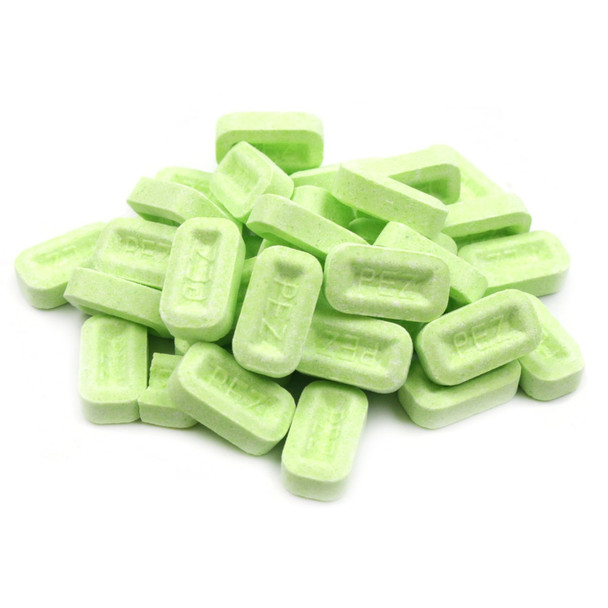 Bulk Pez sour apple candy, bright green, loose, over 600 pieces per pound, tangy and sweet.