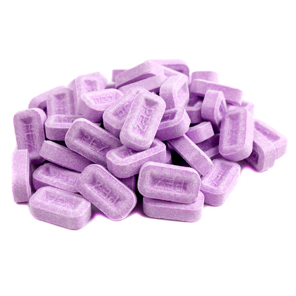 Vibrant purple Pez bulk grape candy, over 600 pressed pieces per pound, sweet and tangy, for candy dishes and sharing.
