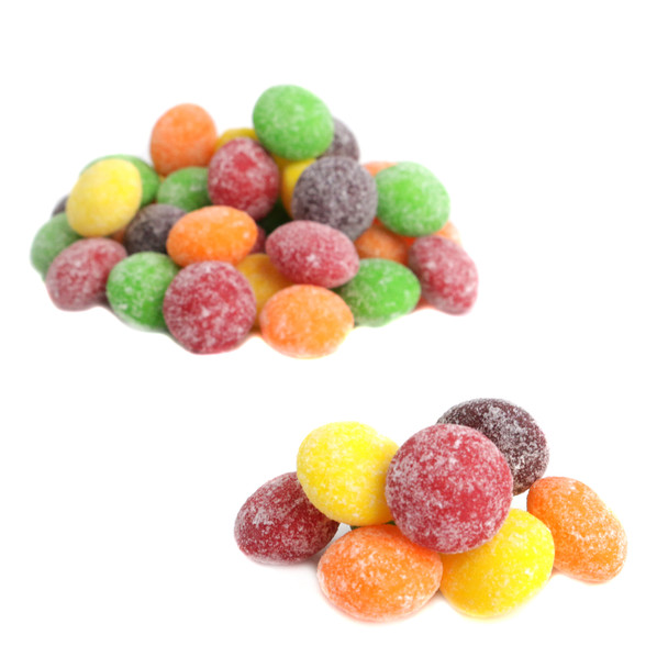 image of two piles of sour skittles