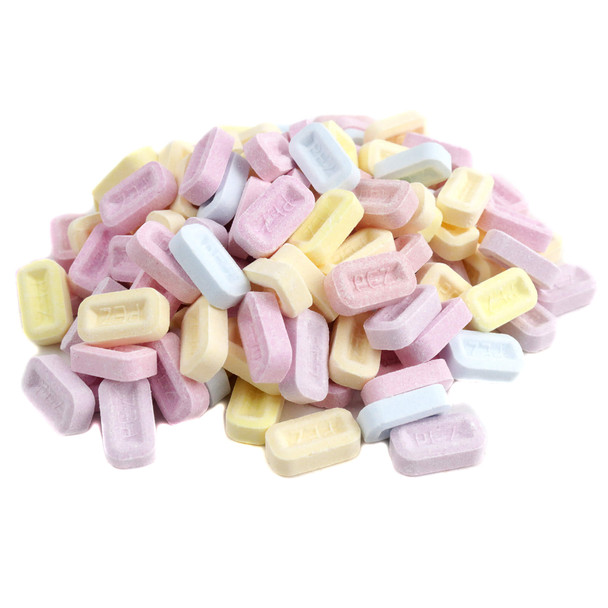 Bulk Pez Assorted Fruit, watermelon, blue raspberry, grape, raspberry, orange, apple, cherry, pineapple flavors.