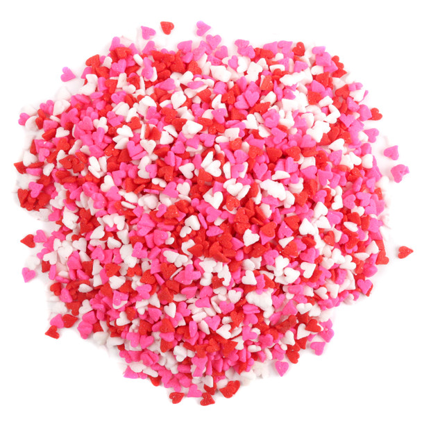 Mini Valentine heart shape sprinkles, red, white, and pink, perfect for decorating cupcakes and desserts.