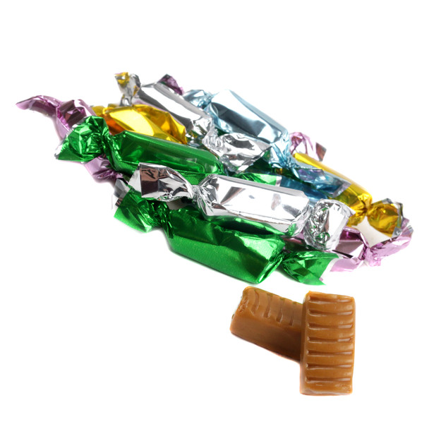 Pastel wrapped buttery caramels, approx 95 pieces per pound. Green apple, pink strawberry, blue vanilla, gold butter rum.