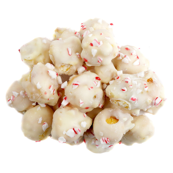 White confectionery-coated popcorn, liberally sprinkled with vibrant red crushed candy cane pieces, peppermint flavor.