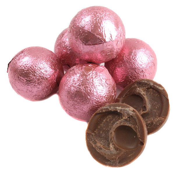 Pile of bright pink foil wrapped double chocolate balls, rich Palmer chocolate candy, approx 35 pieces per pound.