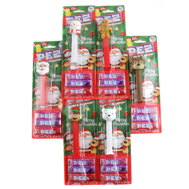 Pez Christmas 12-piece Blister Pack with colorful fruit candy rolls. Red, yellow, orange, purple, green candies visible.