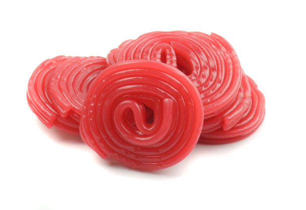 Four 4.4lb bulk packs of bright red strawberry licorice wheels, classic rolled candy.