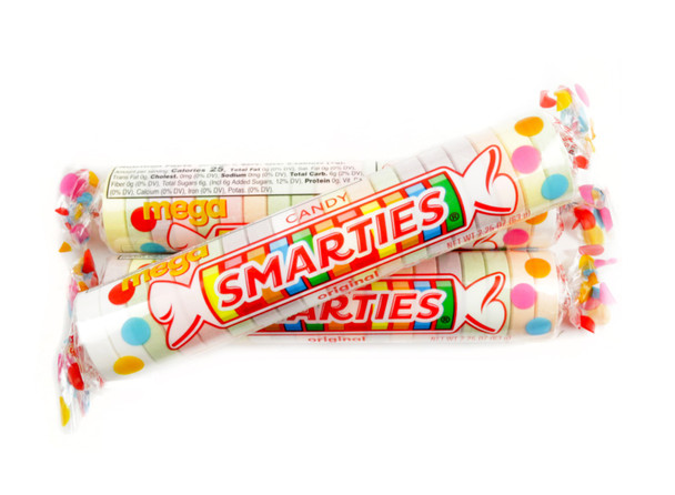 12 boxes of Mega Smarties, 24 large 1-inch multicolored pastel candy rolls in each box.