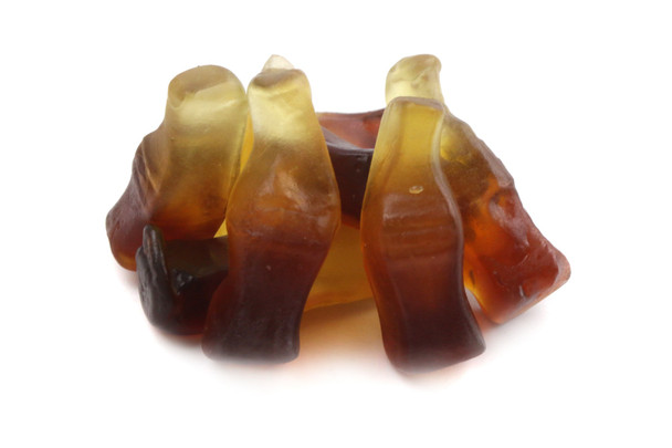 Four 5lb bags of brown, cola-flavored gummy candy bottles. Soft, chewy, approx 2800 pieces total.