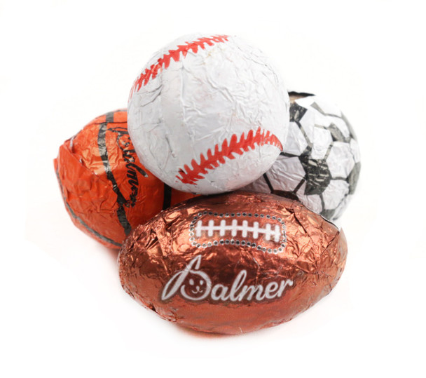 24lb case, assorted foil-wrapped chocolate sports balls, including footballs, baseballs, basketballs, soccer balls. Approx 90 per pound.