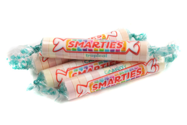 Smarties Tropical 40lb bulk candy rolls, vibrant assortment, tart tropical flavors.