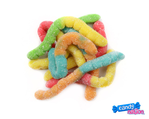Many 4-inch long Sour Gummy Worms with blue, yellow, orange, red, green colors and a sour sugar coating.