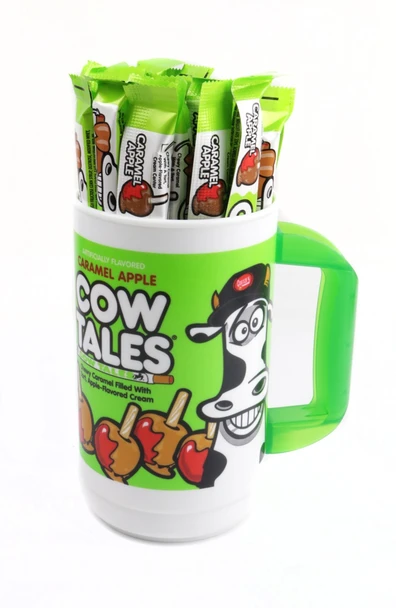100 green and brown Caramel Apple Cow Tales, individually wrapped, in a clear tumbler. Chewy candy sticks.