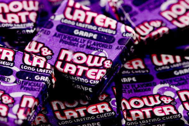 Now and Later Grape taffy, purple bite-size squares, 12 individually wrapped packs, 24 count total.