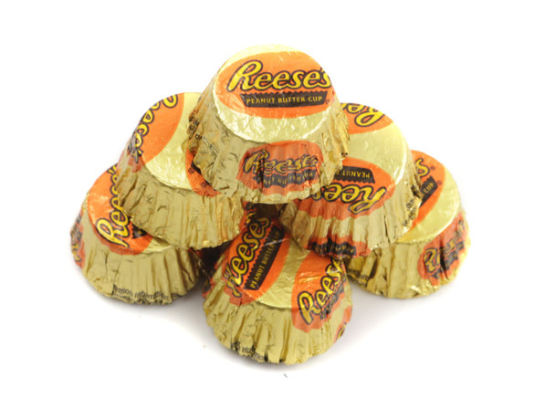 25lb bulk Reese's Mini Peanut Butter Cups, milk chocolate, creamy peanut butter filling, shiny golden foil wrappers, bite-sized.