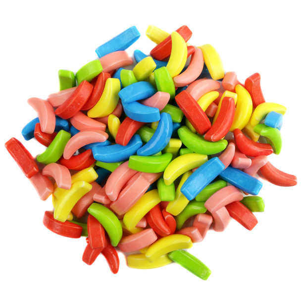 Bulk Crazy Bananas Pressed Candy, bright multi-colored banana shapes, 24.7LB wholesale box, approx 680 per pound.