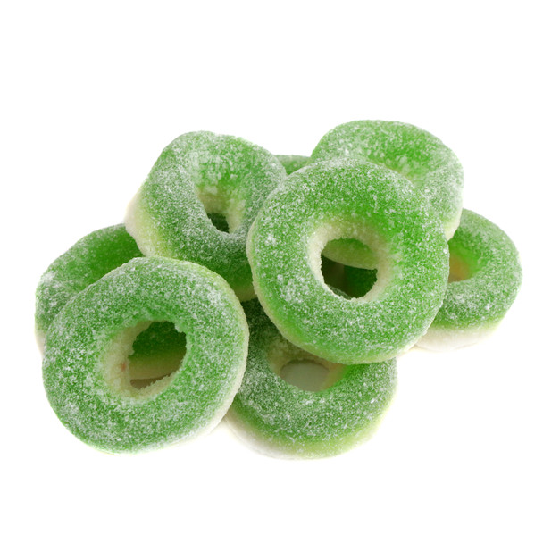 Bright green and white Apple Gummy Rings. Four 5lb bags of sweet, chewy candy.