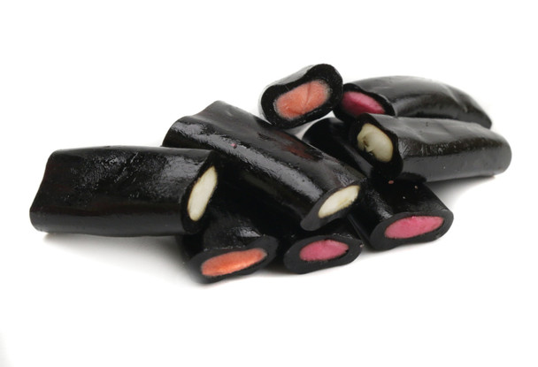 Pile of soft, bite-sized black Licorice Rockies with visible white cream filling. 4/4.4lb case from Italy.