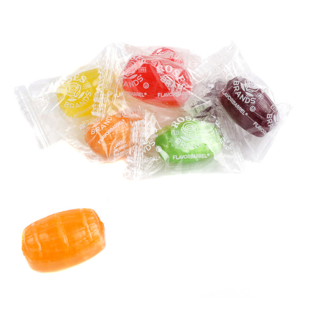 Assorted colorful hard candy barrels, red cherry, orange, green apple, purple grape. Classic fruity FlavorPops.