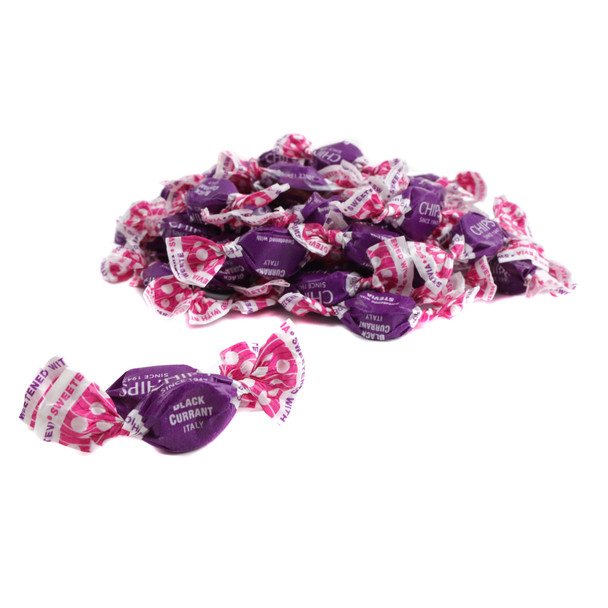 Bulk display of dark purple Chips Black Currant Sugar Free candies, approx. 340 pastilles per pound.