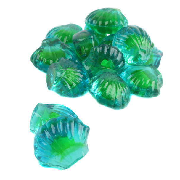 Vibrant blue 3D gummy seashells, approx 90 per pound, with chewy texture and raspberry jelly centers.