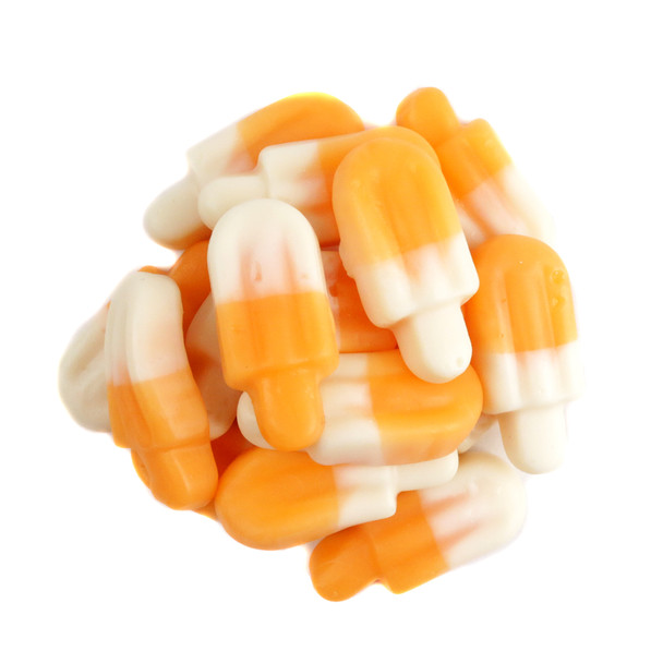 Vibrant two-tone orange and white gummy popsicles, soft and chewy, with orange and cream flavors.