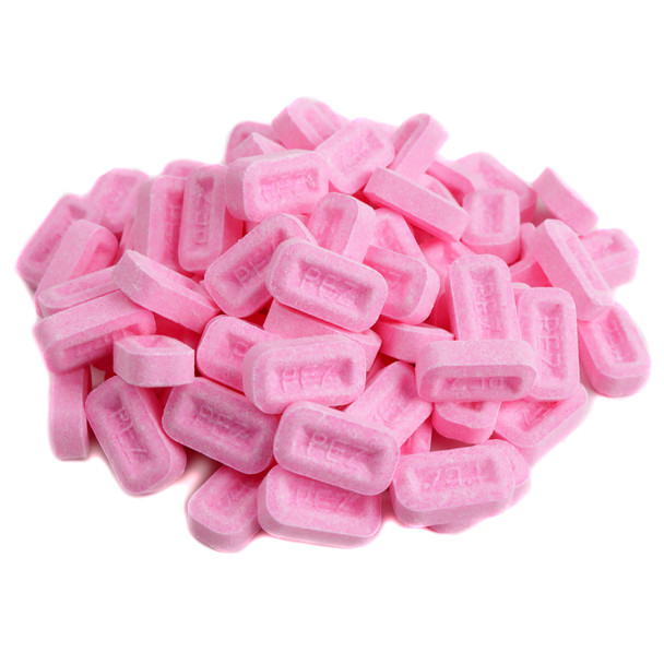 Pez Candy, bulk unwrapped pink strawberry flavored candy.