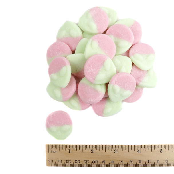 Vibrant pink, light green alien-shaped Gummy Aliens. Tangy watermelon flavored bulk gummy candy, approx. 53 pieces per pound.
