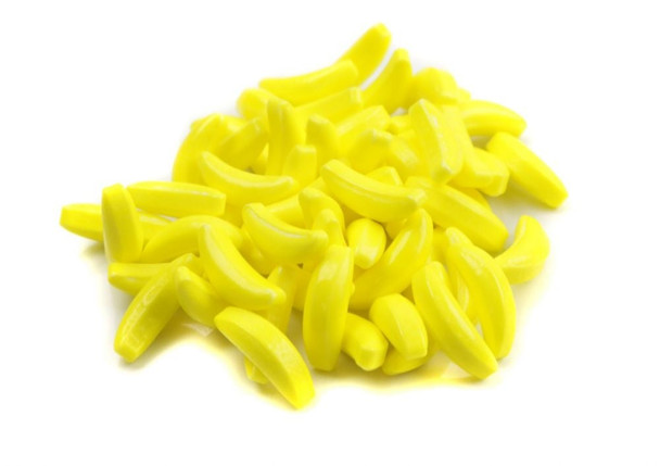 Vibrant yellow Bananarama Banana Candy, banana-shaped hard pressed candies, irresistible banana flavor, approx 800 per pound.