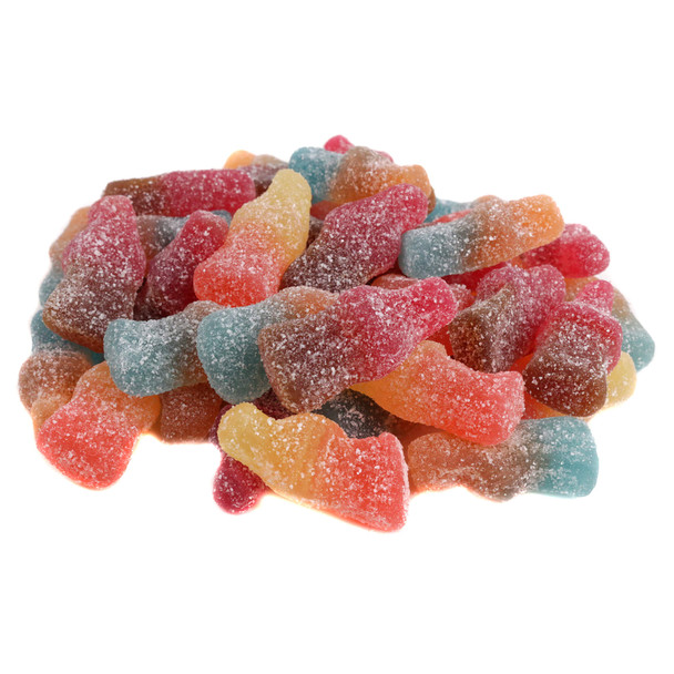 A pile of soda bottle-shaped Haribo sour gummies coated in sour sugar crystals