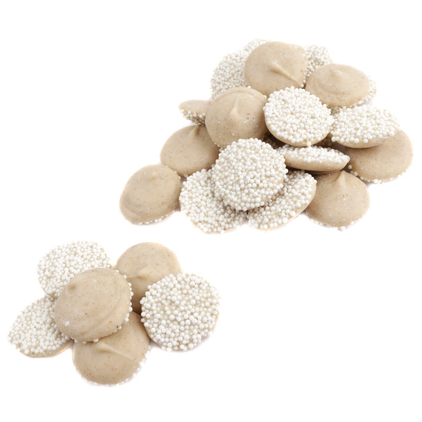 Pumpkin roll nonpareil disc showing smooth white confection and crunchy sprinkles