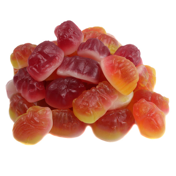 Bulk display of colorful Vidal gummy bugs including worms, beetles, and caterpillars
