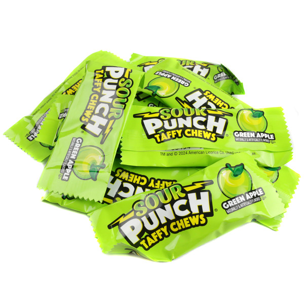 Individually wrapped bright green Sour Punch Green Apple Taffy Chews.