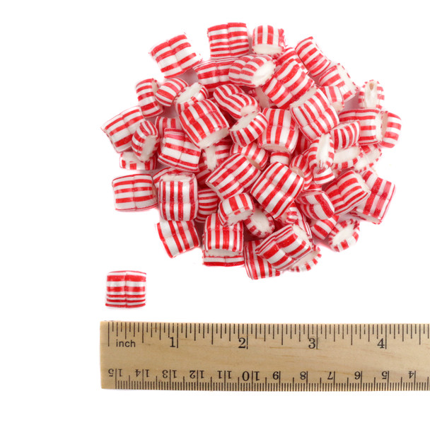 Close-up of red and white striped Atkinsons Maiden Kisses peppermint hard candies.