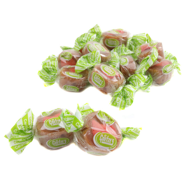 Goetze's Caramel Creams Apple candy, multiple chewy tan caramel rings, white cream centers. Iconic Bull's-Eye apple caramel candy.