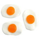 Giant Gummy Fried Eggs, 35 peach flavored pieces, 3 inches each. White & orange gummy candy.