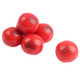 Handful of Dubble Bubble Hot Cinnamon gumballs on a clean white background